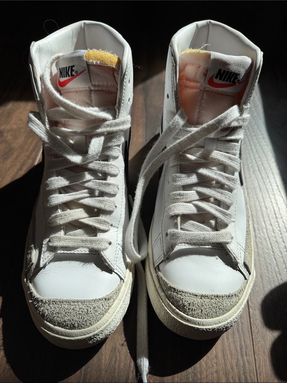 Nike White High-Top Sneakers with Red Logo and Suede Toecap